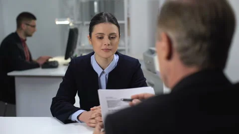 Boss checking female employee work results, probationary period at workplace Stock Footage 112107545