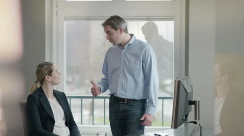 Boss complimenting on employee's work Video stock 66894882