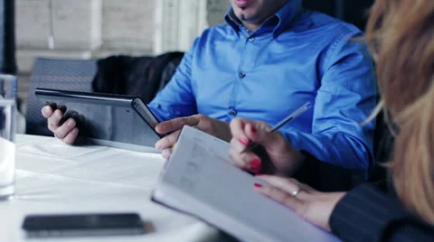 The boss explains the business plan for its employee Stock Footage 33355215