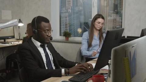 Boss giving another task to a young man Stock Footage 125456942