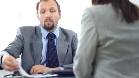 Boss giving reprimand to female worker HD Stock Footage