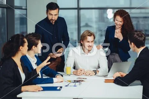 Boss leader coaching in office. On job training. Business and Education concept Stock Photos