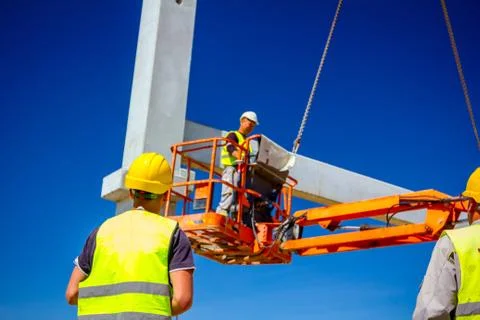 Boss oversees, control work on construction site Stock Photos