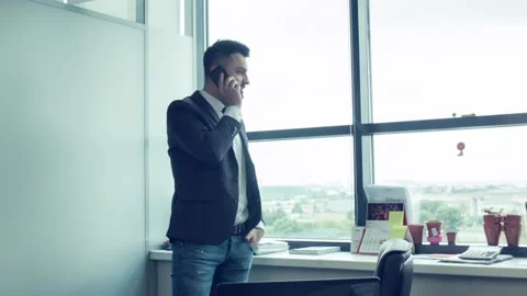 Boss on phone in the office. Stock Footage 92732124
