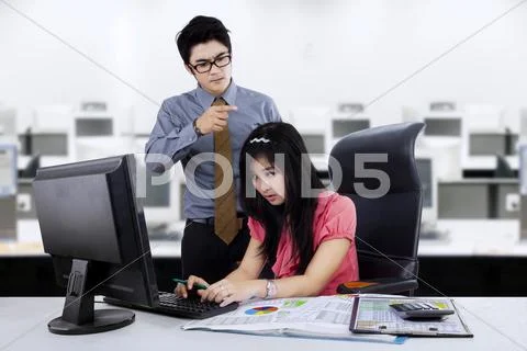 Boss shouting at employee Stock Photos