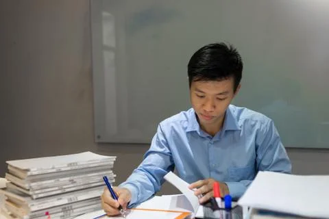 The boss taking note in sales report Stock Photos