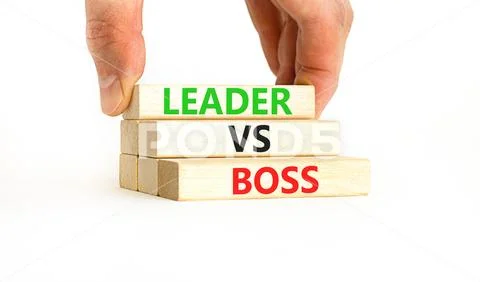 Photograph: Boss vs leader symbol. Concept words Boss vs versus leader ...