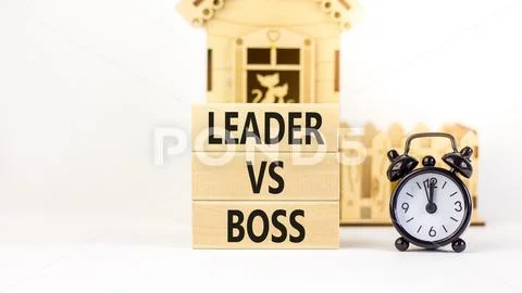 Boss vs leader symbol. Concept words Boss vs versus leader on wooden ...