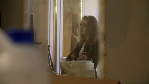 Boss is watching through the window 스톡 동영상 165513789