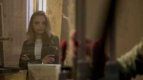 Boss is watching through the window 스톡 동영상 165514062