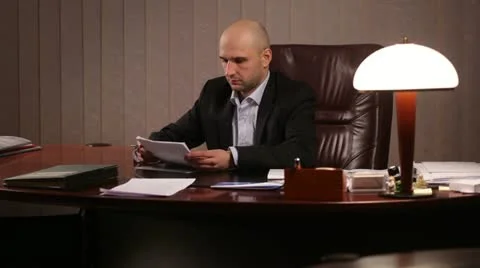Boss working after hours Stock Footage 10955418