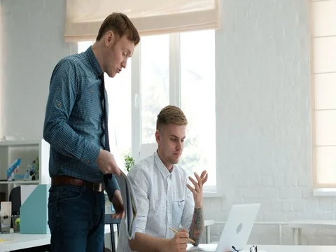 Boss is yelling at worker . the chief fires the worker Stock Footage 75455941