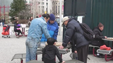 Boston Chinatown People Playing Chess in Park near Chinatown Gate, early spring Stock Footage