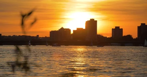 Boston City Skyline Over the Water, Sunset Stock Footage