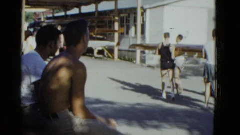 BOSTON MASS-1951: Couples Posing At Lakeside Camp With Rowing Shells Video stock 125877879