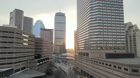 Boston Prudential tower rising drone shot with sun on cloudy day 30 fps Stock Footage 183511039