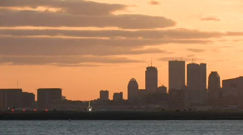 Boston skyline harbor sunset takeoff close Stock Footage 353070