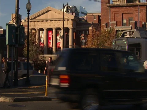 Boston subway car passes in front of old Brigham and Women's hospital building Stock Footage 86750309
