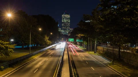Boston Traffic Time Lapse of Hancock Tower over Soldier's Field Road Stock Footage