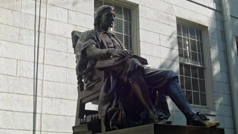 Boston's John Harvard statue during the day Stock Footage 305432818
