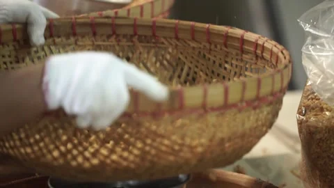 Both hands are mixing fried beans and spices Stock Footage 259270964