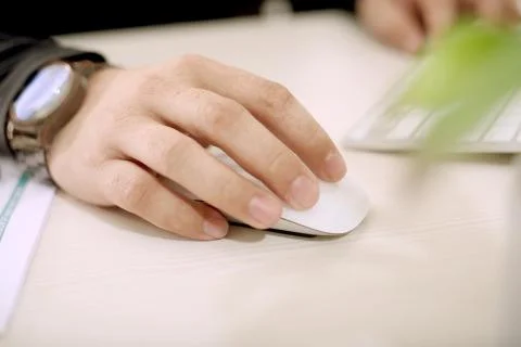 Both hands on the mouse Stock Photos