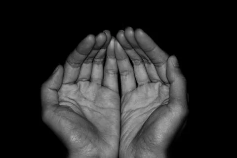 Both hands in praying gestures Stock Photos