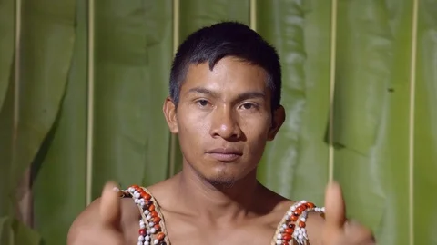 Both hands saying ok to the camera like something good happened or trying to Stock Footage 113214706