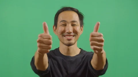 Both hands saying ok to the camera like something good happened or trying to Video stock 115327520