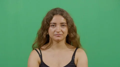 Both hands saying ok to the camera like something good happened or trying to Stock Footage 117714529