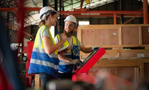 Both of mechanical engineers are checking the working condition of the new... 스톡 사진