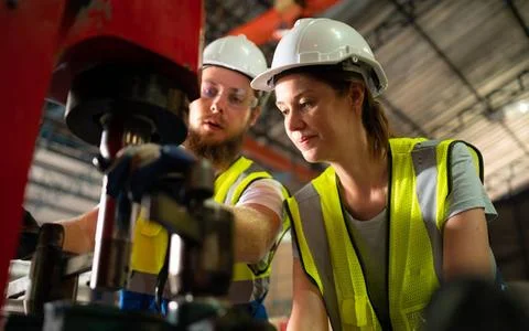Both of mechanical engineers are checking the working condition of the new... 스톡 사진