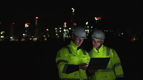 Both of Petroleum engineer is on a mission to inspect oil distillation Stock Footage 292191669