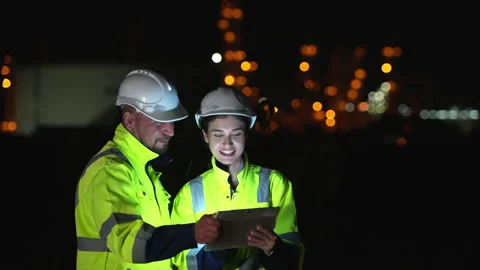 Both of Petroleum engineer is on a mission to inspect oil distillation Stock Footage 292191893