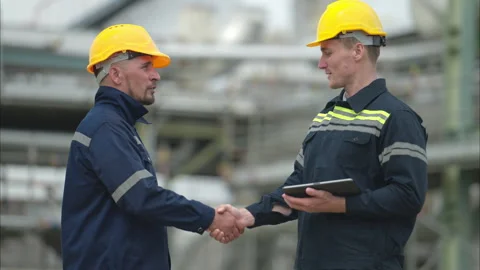 Both of Petroleum engineer is on a mission to inspect oil distillation Stock Footage 292212342