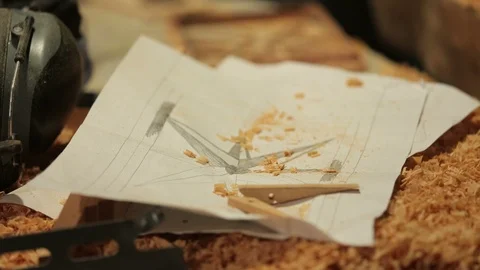 Both project and his achievement on the artisan carpenter workbench Stock-Footage 100984352