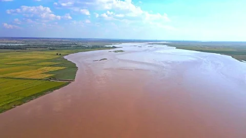 On both sides of the Yellow River in autumn - the land rivers of the plains Stock Footage 229367571