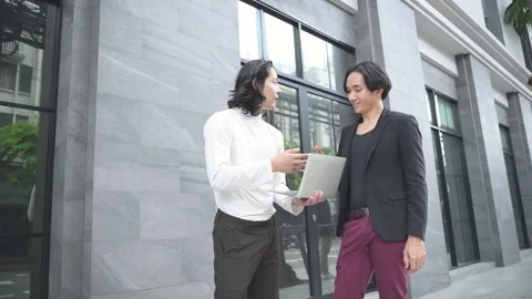 Both of young asian businessman using laptop Stock Footage 252376181