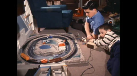 Bothers with Toy train set 1950's Video stock 49073023