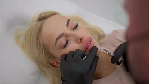 Botox injected into the lips Stock-Footage 248759252
