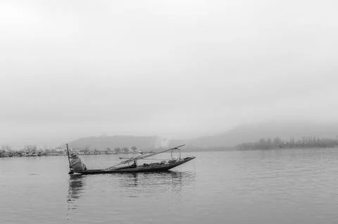Bots called "Shikara" are often used by residents of Kashmir on the Dal Lake Stock Photos