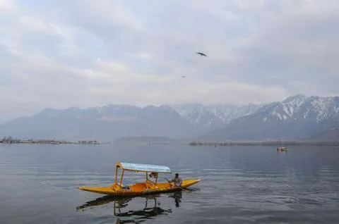 Bots called "Shikara" are often used by residents of Kashmir on the Dal Lake Stock Photos