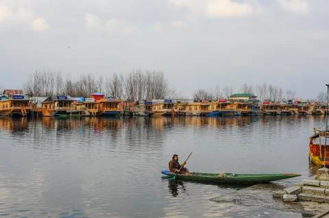 Bots called "Shikara" are often used by residents of Kashmir on the Dal Lake Stock Photos