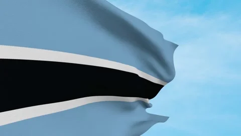 Botswana Flag Waving In Blue Sky Stockbeeldmateriaal 240651097