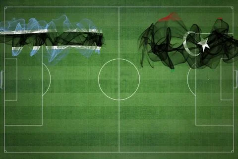 Botswana vs Libya Soccer Match, national colors, national flags, soccer field Illustrazione stock