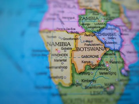 Botswana on world map with focus and blur other countries. Stock Photos