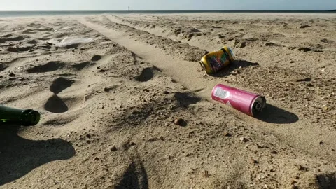 Bottle and cans on beach Stock Footage 251700583