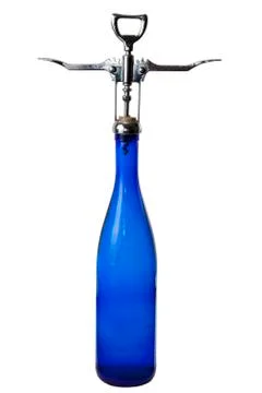 Bottle and corkscrew on white background Stock Photos