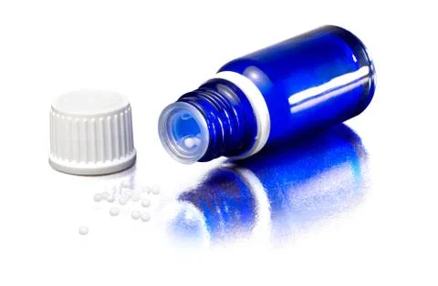 Bottle and globules Stock Photos