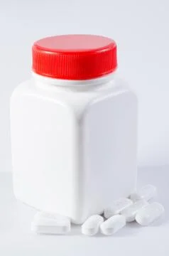 Bottle and pills Stock Photos